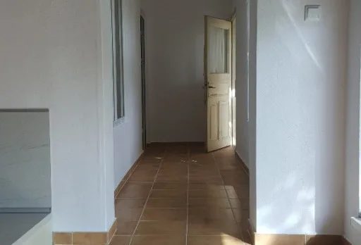 Bau- und Reparaturarbeiten an einem Haus bei Krapets