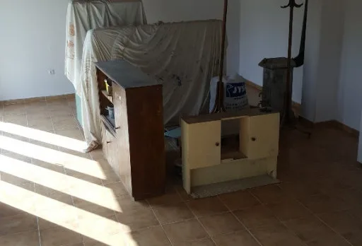 Bau- und Reparaturarbeiten an einem Haus bei Krapets