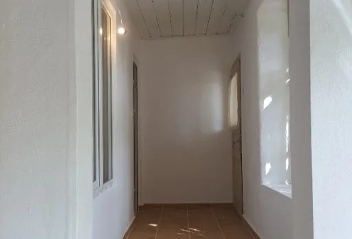 Bau- und Reparaturarbeiten an einem Haus bei Krapets
