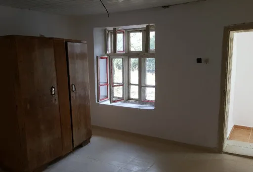 Bau- und Reparaturarbeiten an einem Haus bei Krapets