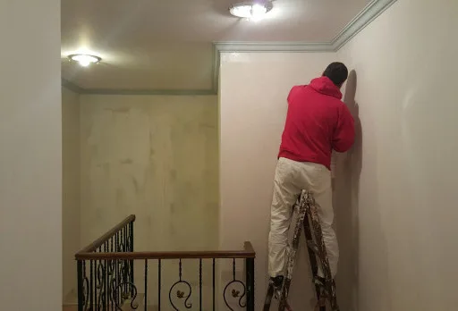 Installation of wallpapers in apartment in Golden sands