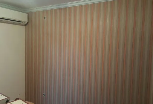 Installation of wallpapers in apartment in Golden sands