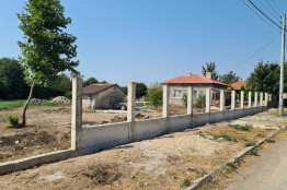 Building a perimeter wall in Krapets village