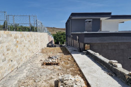 Construction of a retaining wall and a concrete path in Balchik